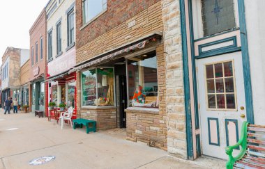 Wilmington USA - August 31 2015; Dilapidated shopfronts on Water Street in small town America along Route 66  Wilmington Illinois, clipart