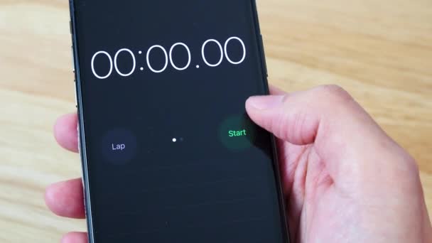 Iphone User Uses Stop Watch Native App Phone Count Time — Stock Video