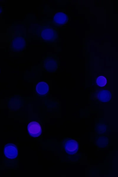 Guirnalda luces boche, fondo azul —  Fotos de Stock