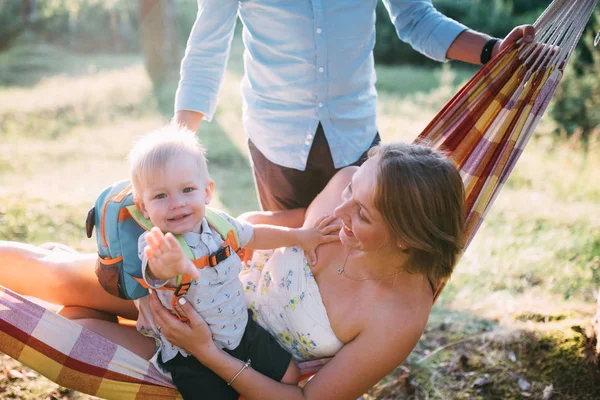 Young Sympathetic Family Mom Dad Son Rest Nature Sitting Hammock — Stock Photo, Image