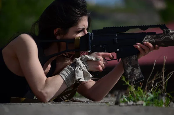 Airsoft game beautiful Girl With Gun.Nice and danger