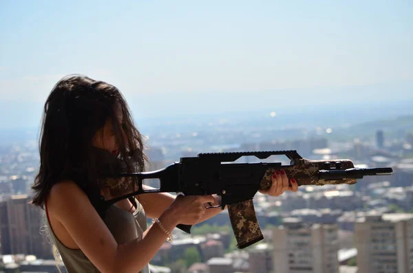 Airsoft game beautiful Girl With Gun.Nice and danger