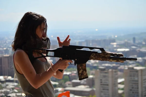 Airsoft game beautiful Girl With Gun.Nice and danger