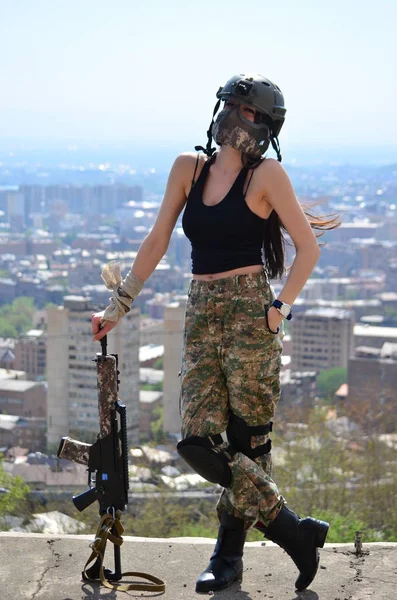 Airsoft game beautiful Girl With Gun.Nice and danger