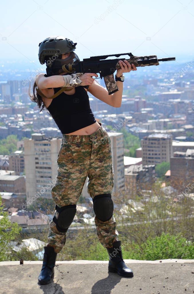 Airsoft game beautiful Girl With Gun.Nice and danger 