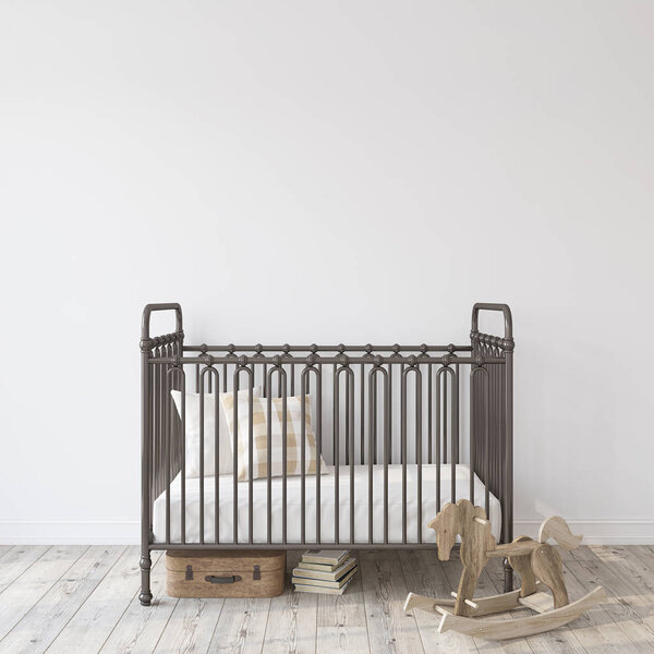 Farmhouse nursery. Black metal crib near empty white wall. Interior mock-up. 3d rendering.