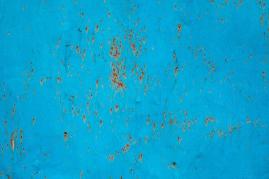 Paslı demir duvar eski mavi boya ile kaplı. Arka plan.