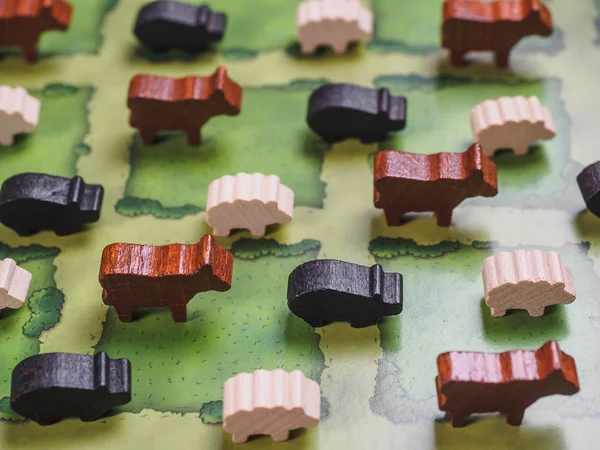 Farm agricola board game with fields figures and animals