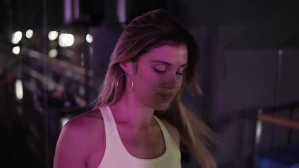 Caucasian Girl Is A Go Go Or Twerk Dancer A Slender Girl Performs A Dance Walking Seductively Soffits Booty Dance Sexy Legs Wearing Color Shorts Performance Close Up View Of Girls Butt