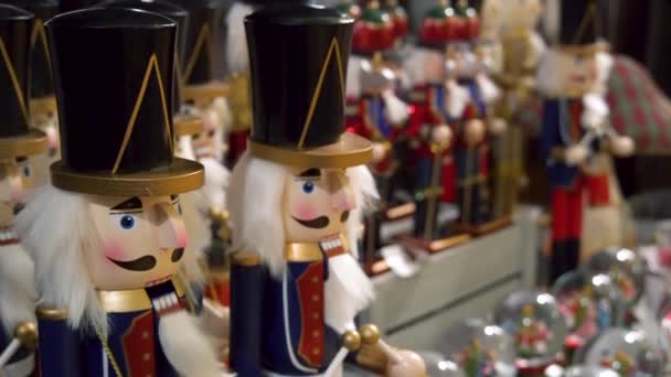 Wooden Nutcracker showcase with Christmas decorations — Stock Video