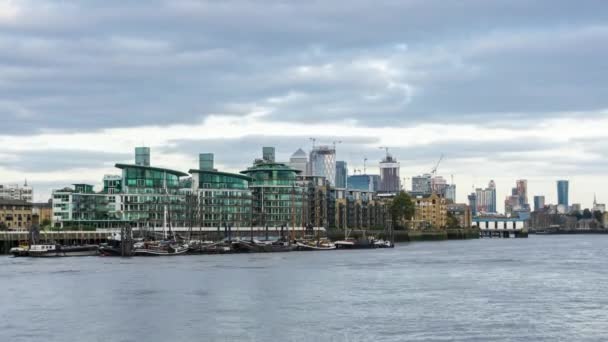 Day time luxury riverside apartment blocks of Cinnabar Wharf, Wapping. London, UK. Time lapse. — Stock Video