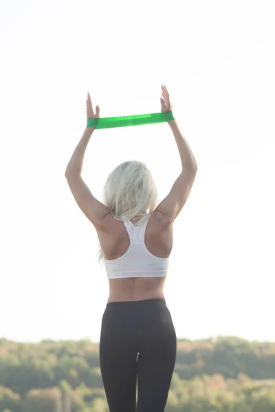 Young Sporty Girl Training Elastic Band Outdoor — Stock Photo, Image