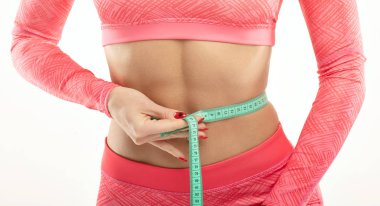 Güzel vücut mükemmel şekli ölçme uygun kadın. Sağlıklı yaşam konsepti.