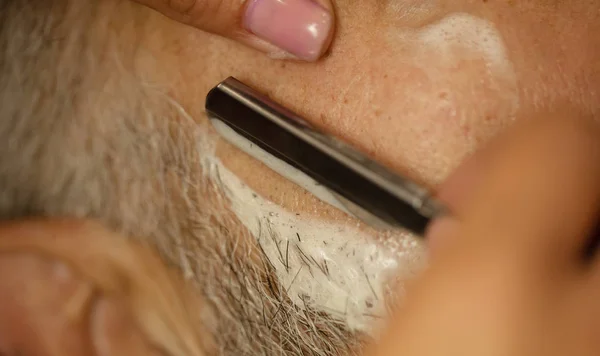 Woman Shaving Man Using Sharp Blade Closeup — Stock Photo, Image