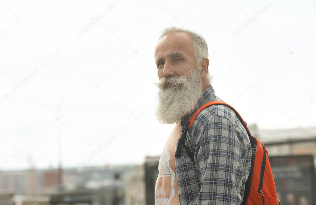 old man backpack