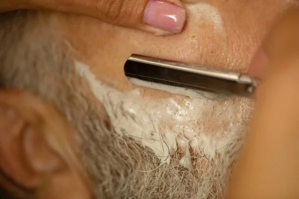 Woman Shaving Man Using Sharp Blade Closeup — Stock Photo, Image