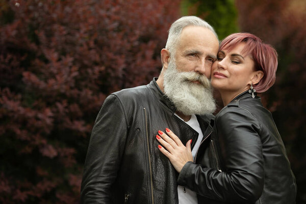 Happy senior couple in love. Park outdoors.