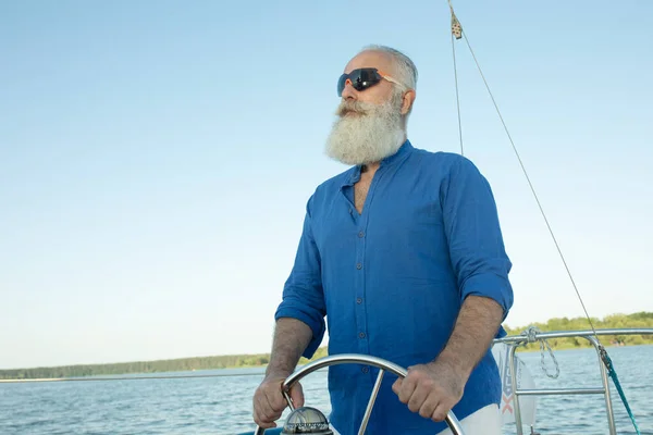 Mature Bearded Man Standing Helm Yacht Out Lake Steering Smiling — Stock Photo, Image