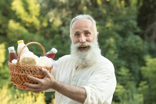 Professional Bearded Senior Farmer Holding Basket Bottles Milk Butter Cheese — Stock Photo, Image