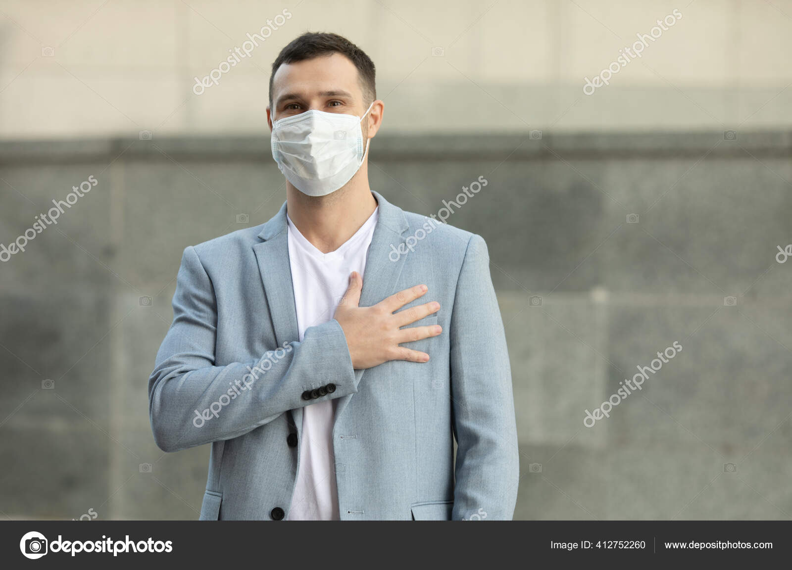 Man Wearing Surgical Mask Greets His Hand Heart New Greeting Stock