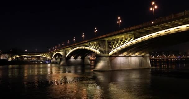 Historic lit Margaret bridge over the Danube at dusk in Budapest — Stock Video