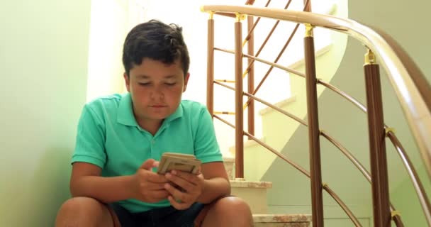 Preteen Boy Laying Sofa Smartphone Texting Message Playing Game Home — Stock Video