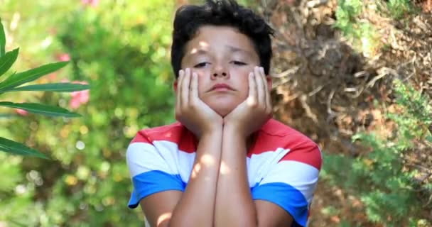 Portrait Unhappy Preteen Boy Sitting Park Looking Very Sad — Stock Video