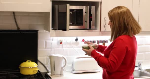 Woman Kitchen Using Microwave Oven — Stock Video