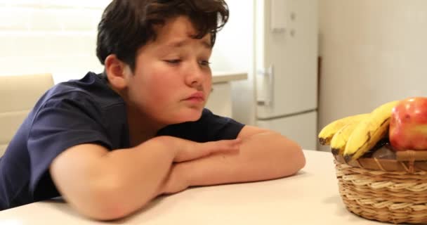 Portrait Unhappy Preteen Boy Sitting Kitchen Alone — Stock Video