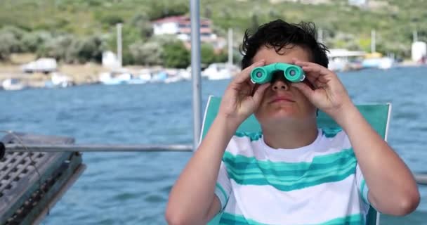 Young boy on boat looking through binoculars 3 — 비디오