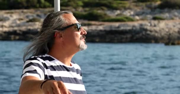 Portrait of a middle aged brunette man on boat — Stock Video