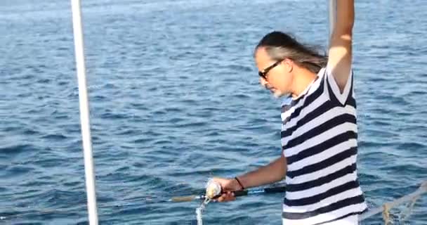 Man fishing on boat at summer vacation 3 — Stock Video