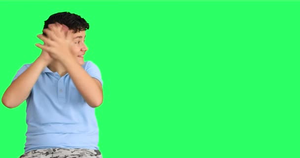 Portrait Smiling Boy Pointing Applauding Chroma Key Green Screen Background — Stock Video