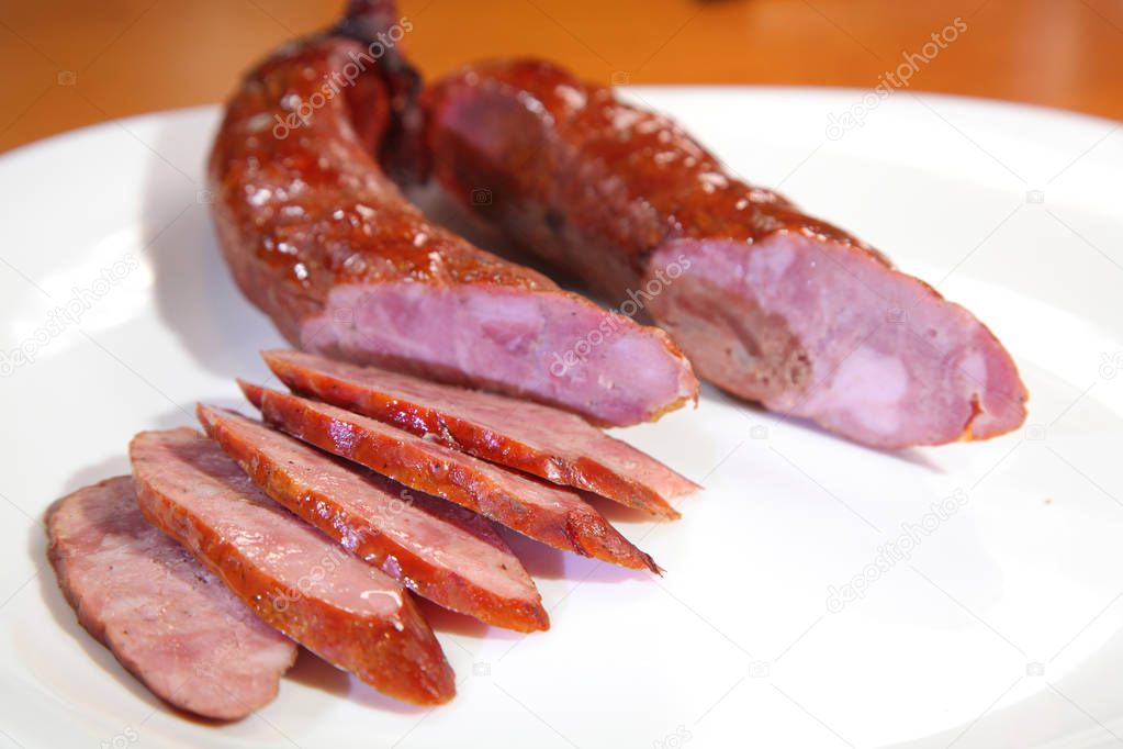 Smoked sausage from homemade pigs. Smoked sausage.