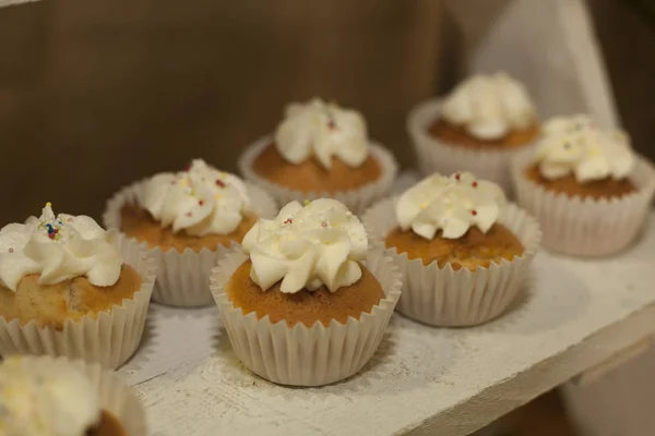Bakery Stock Muffins Covered Cream — Stock Photo, Image
