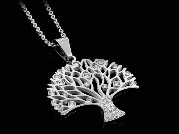 Jewelry necklace. The Tree of Life theme. Stainless steel. One background color