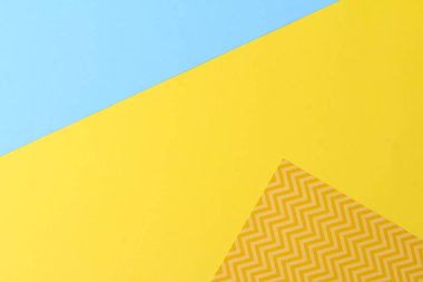 Modaya uygun renklerin doku arka planı: sarı, turkuaz ve geometrik desen 