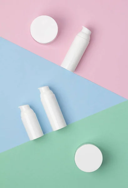 Treatment cosmetics branding mockup, top view on creative colorful background — Stock Photo, Image