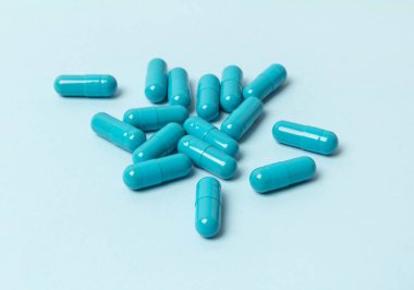 Pastel arka planda mavi haplar. Kadıngüzellik bl için Şablon