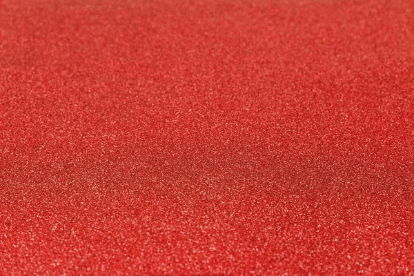 Shiny glitter red bachground texture. Glittering red paper — Stock Photo, Image