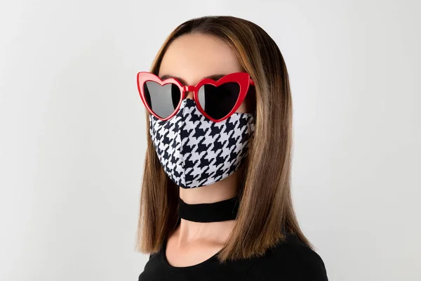 Fashion portrait of beautiful woman in fashionable protective mask — Stock Photo, Image