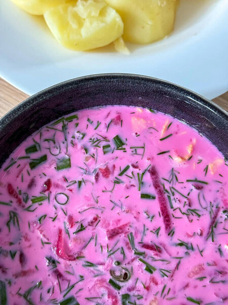 Kholodnik, cold beetroot soup with kefir and hot boiled potatoes. Slavic cuisine