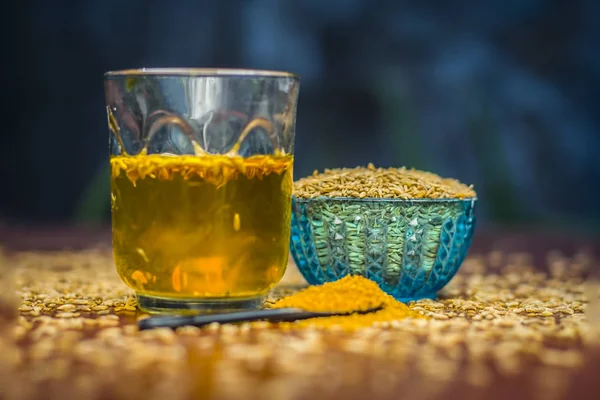 Semillas Comino Con Polvo Agua Extraída Superficie Madera — Foto de Stock