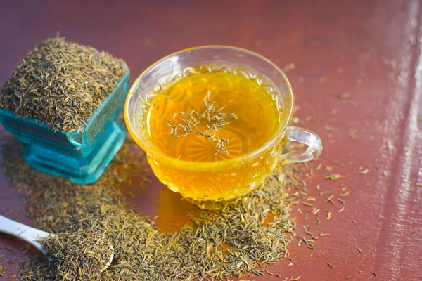 Black Cumin Seeds Its Tea Wooden Surface — Stock Photo, Image