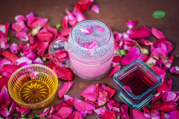 Traditional Indian cold drink Gulab Shake with rose petals