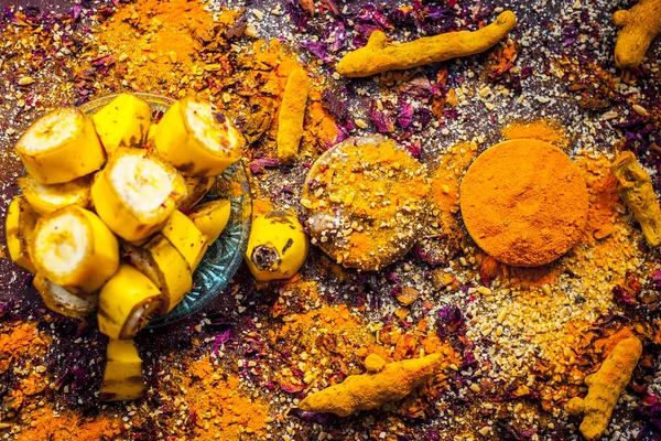 Banana face pack with turmeric powder and rose petals