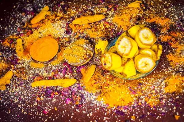 Banana face pack with turmeric powder and rose petals