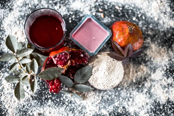 Herbal face pack of pomegranates, oats and rose leaves