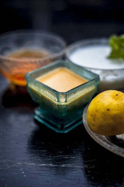 Yogurt face pack from lemon juice with honey and turmeric powder