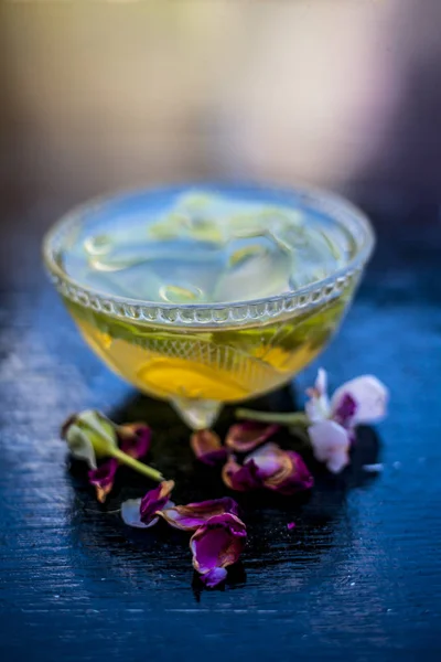 Face pack of rose water with aloe vera and flowers